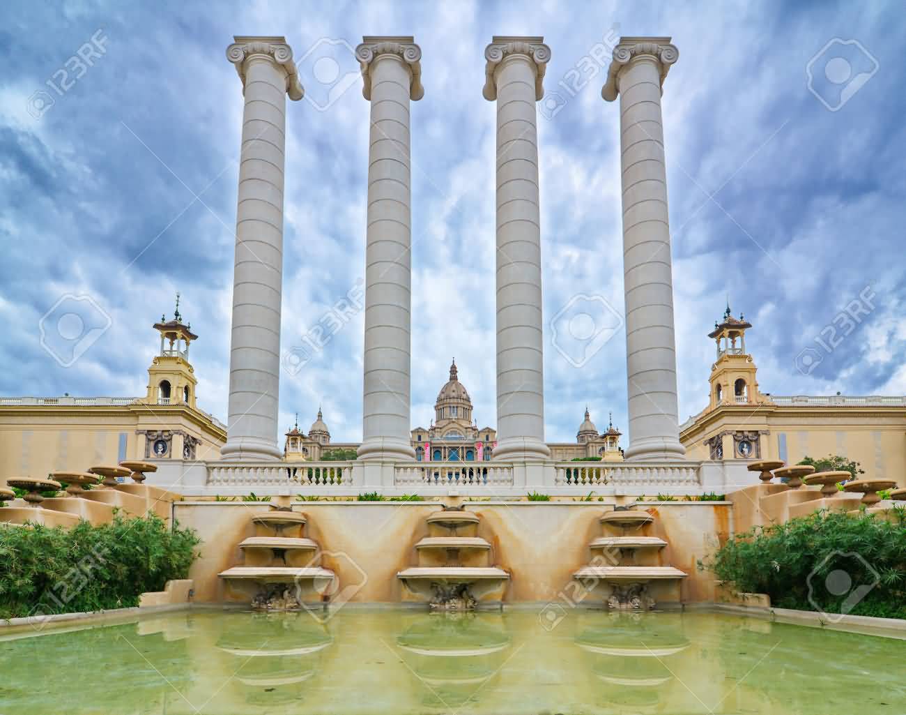 Doric Columns And Reflecting Pool In Front Of The Palau Nacional