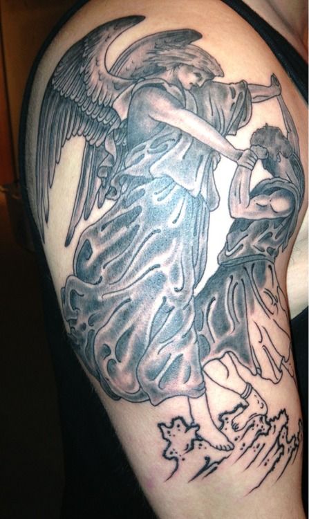 Fighting Angel Tattoo On Right Shoulder