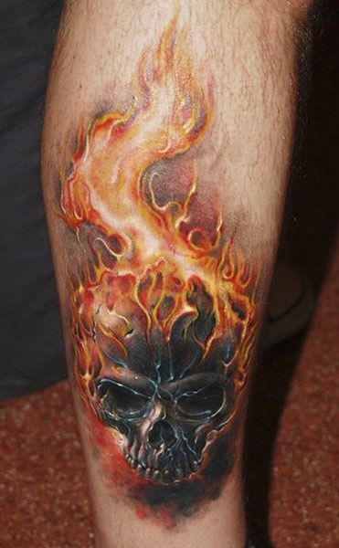 Flaming Skull Tattoo On Side Leg