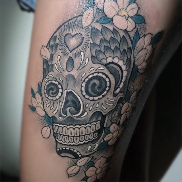 Flowers And Grey Sugar Skull Tattoo On Thigh