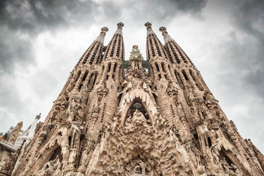 Front Facade Of The Sagrada Familia Basilica In Barcelona