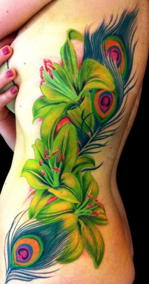 Girl With Green Flowers And Peacock Feather Tattoos On Side Rib