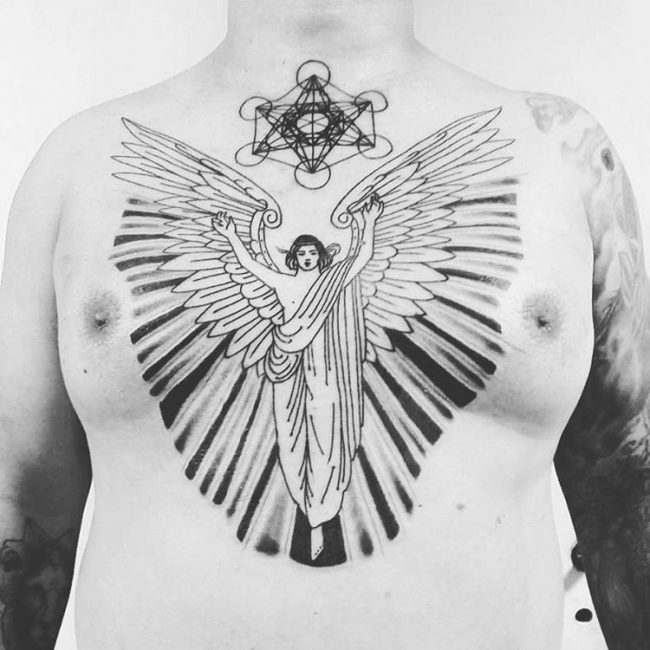 Grey And Black Angel Tattoo On Man Chest
