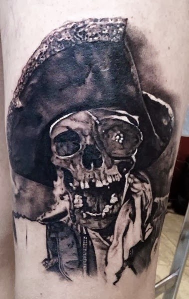 Grey And Black Skull Tattoo Idea