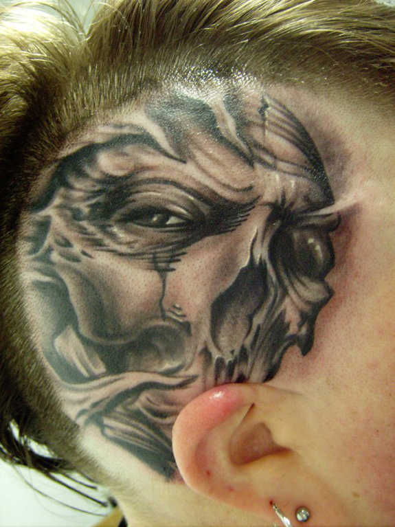 Grey And Black Skull Tattoo On Head