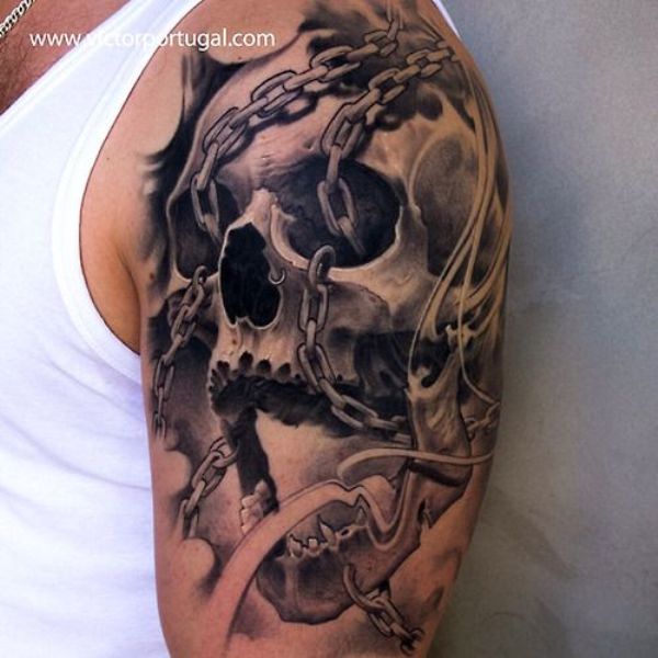 Grey Ink Chain And Skull Tattoo On Left Shoulder