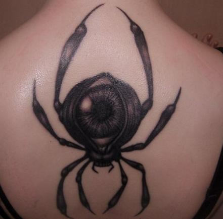Grey Ink Spider Tattoo On Girl Upper Back