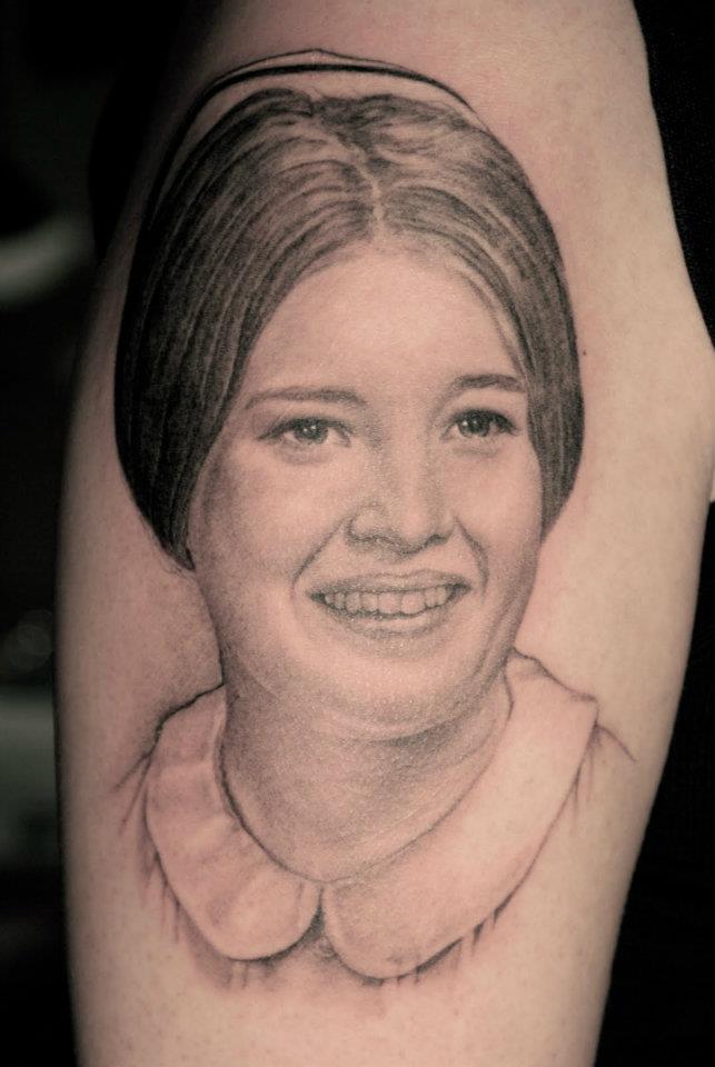 Grey Lady Face Tattoo On Half Sleeve By Tom Renshaw