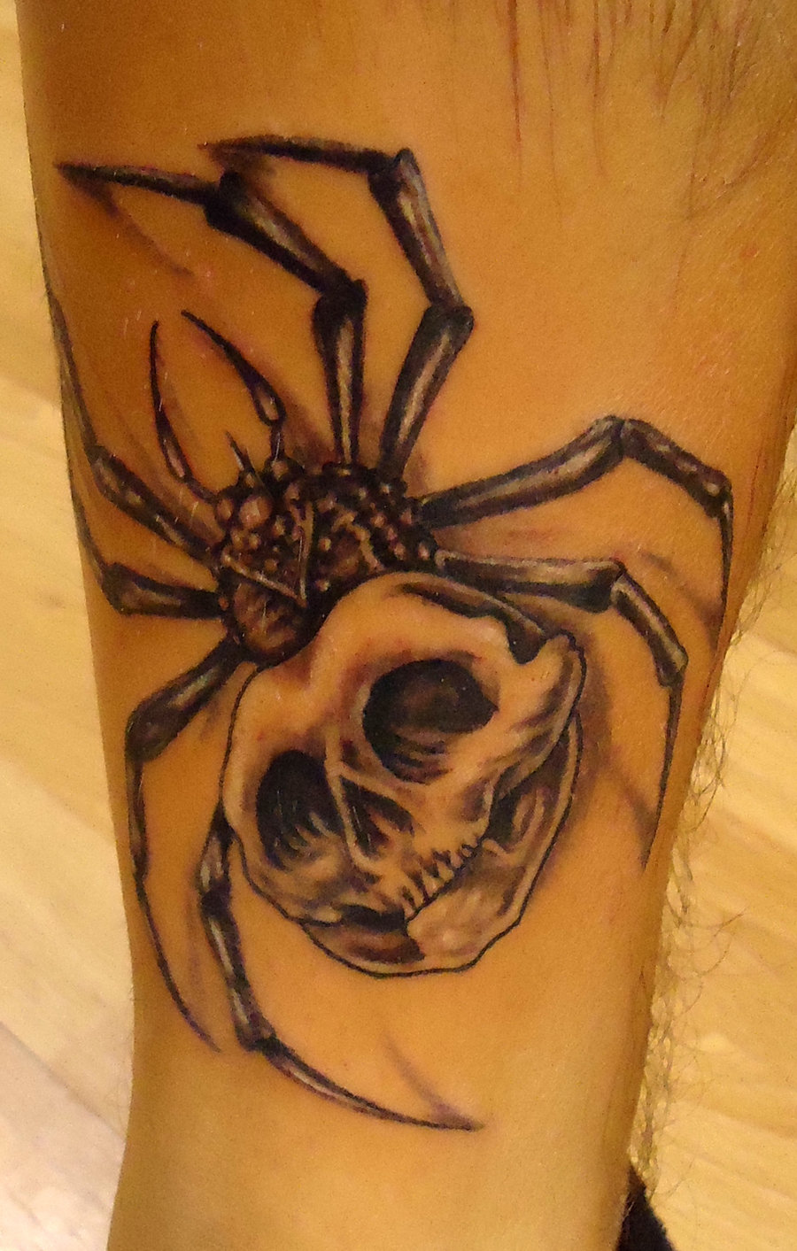 Grey Skull Spider Tattoo On Leg