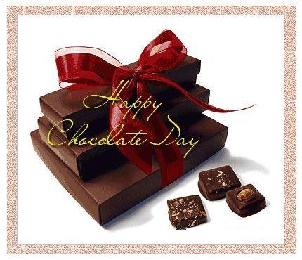 Happy Chocolate Day Chocolate Boxes With Red Ribbon Bow