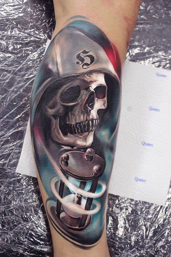 Hourglass And Skull Tattoo On Leg