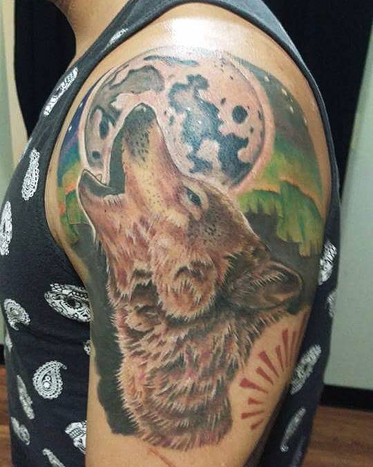 Howling Wolf Head Tattoo On Man Left Shoulder By Laura Frego