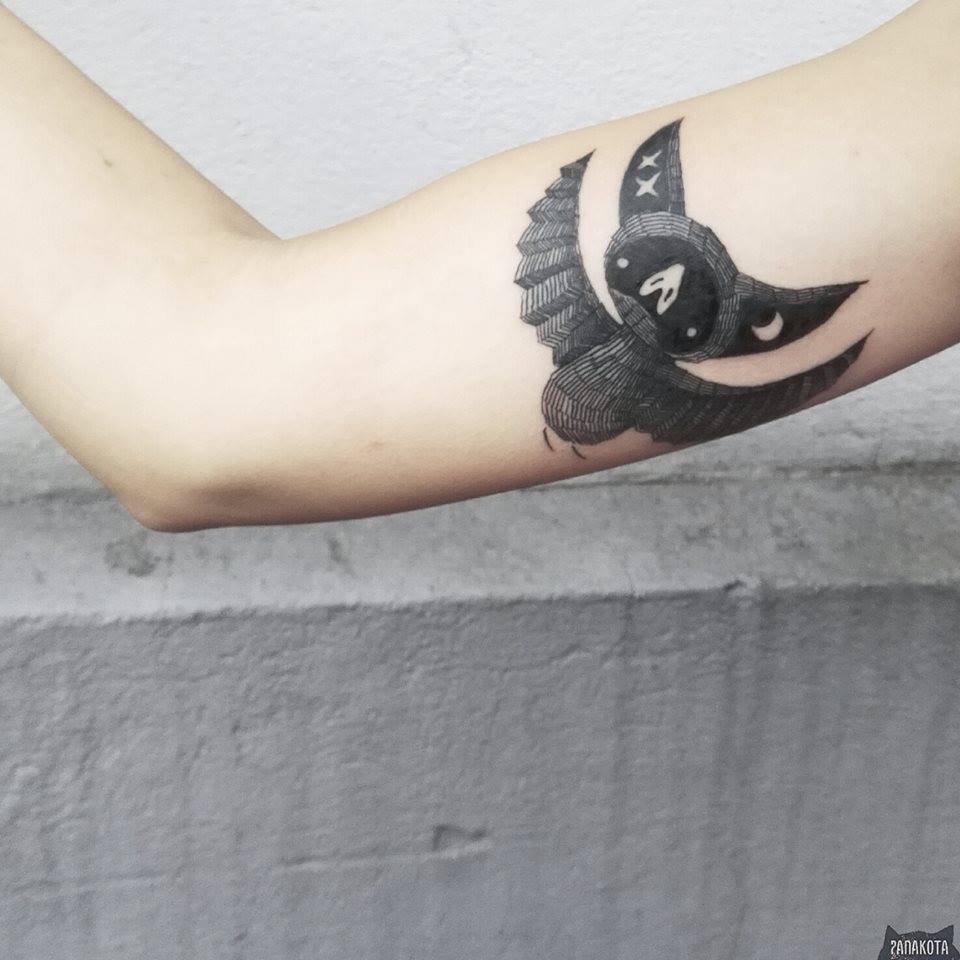 Impressive Black Ink Flying Bat Tattoo On Right Bicep By Panakota