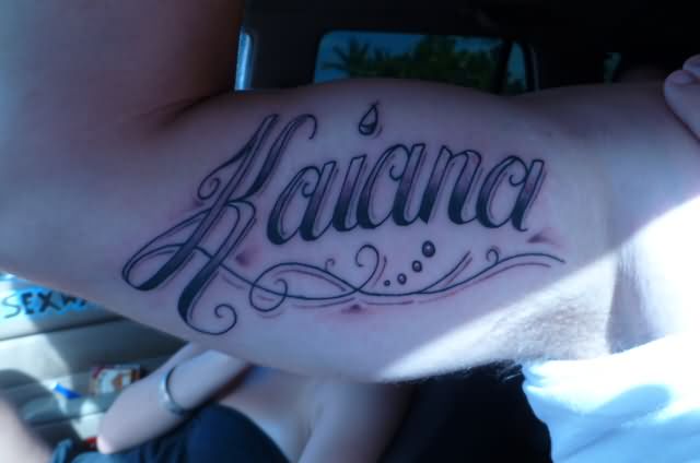 Kaiana Lettering Tattoo On Right Bicep