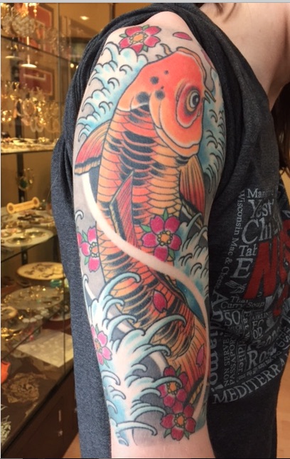 Koi Fish Tattoo On Man Right Half Sleeve