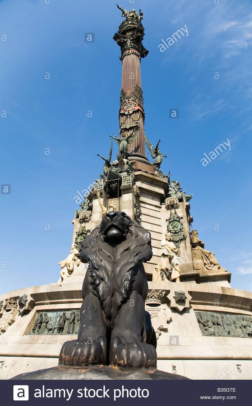 Lion Statue At The Base Of Columbus Monument In Barcelona