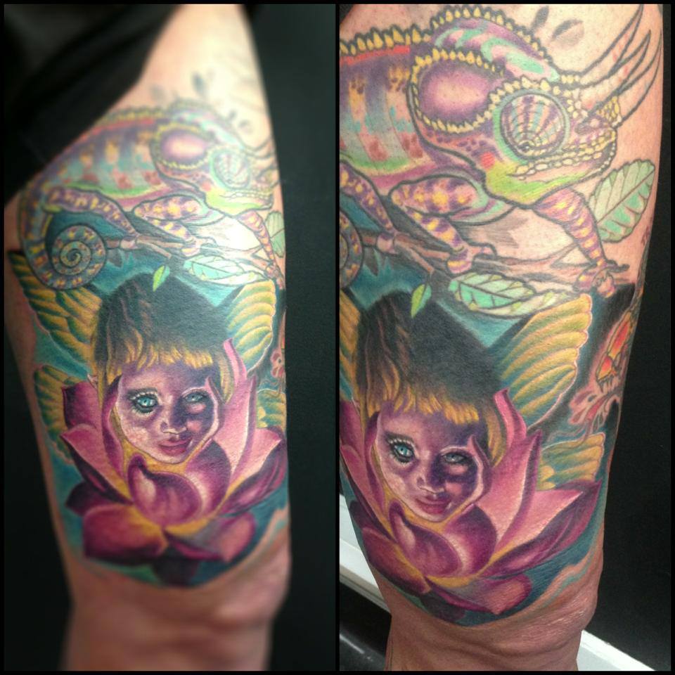 Little Pixie Fairy With Lotus Flower And Chameleon Tattoo On Thigh