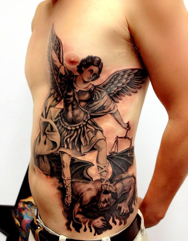 Man With Archangel Tattoo On Rib Side