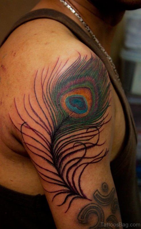 Man With Peacock Feather Tattoo On Right Shoulder