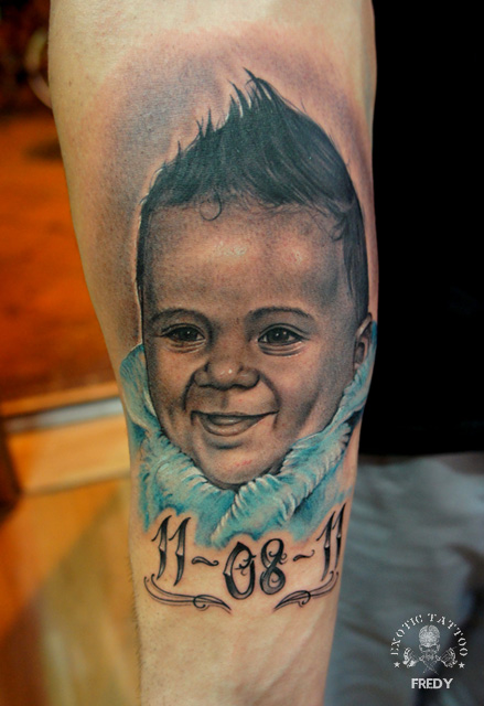 Memorial Cool Baby Portrait Tattoo On Right Forearm
