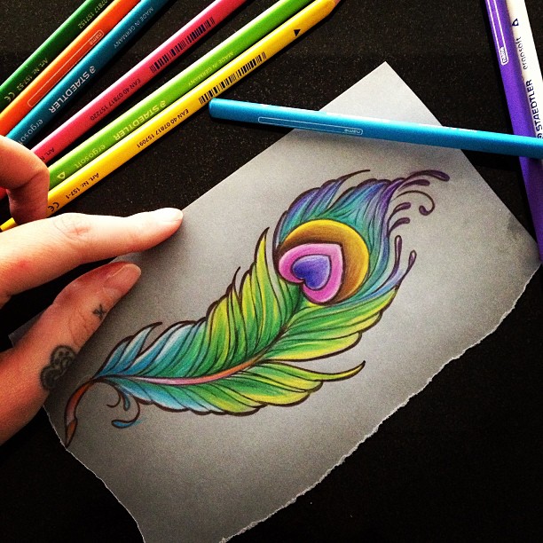 Nice Colorful Peacock Feather Tattoo Design