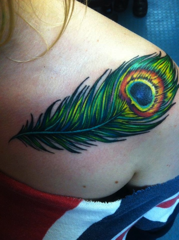 Nice Peacock Feather Tattoo On Girl Back Shoulder