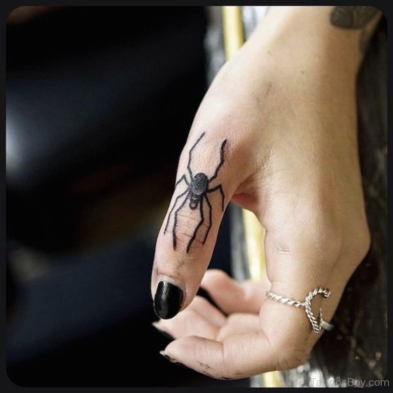 Nice Spider Tattoo On Left Thumb