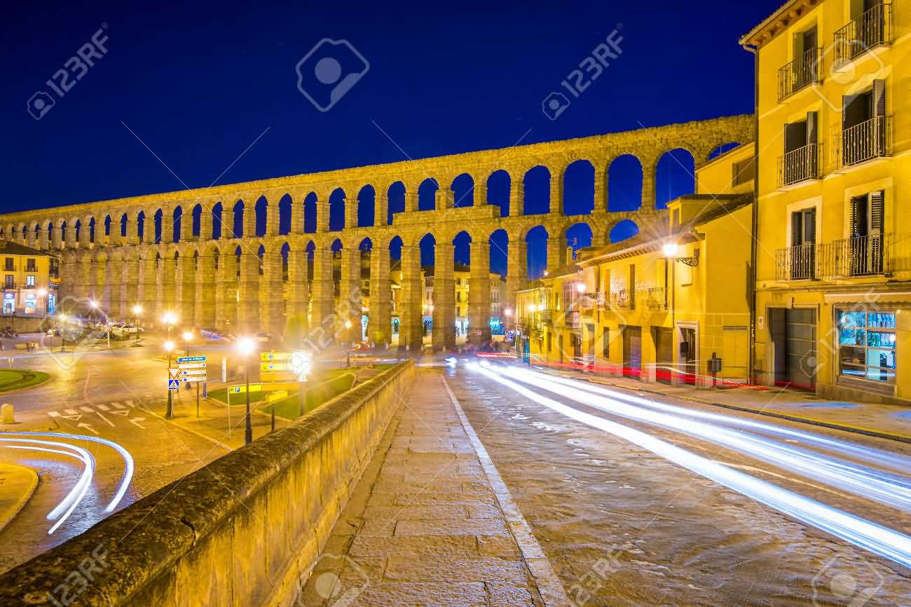 Night View Of The Ancient Roman Aqueduct Of Segovia