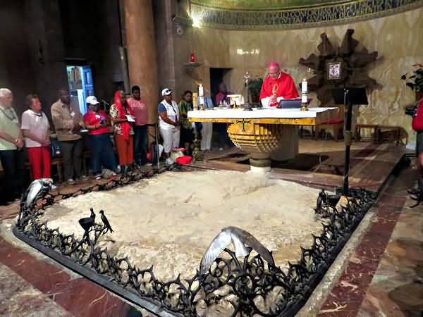People Pray At The Rock Of The Agony In The Church Of All Nations