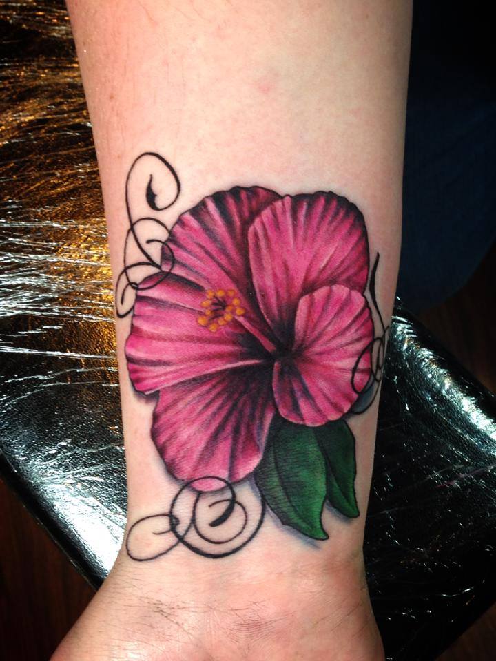 Pink Hibiscus Flower Tattoo On Wrist By Omar