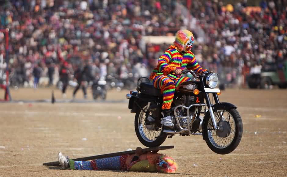 Policemen Dresses As Clowns Perform A Stunt During The Republic Day Parade