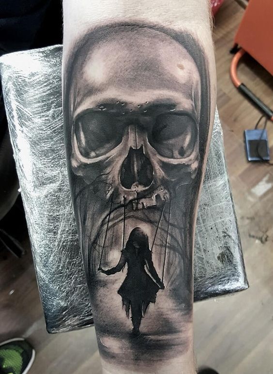 Realistic Grey Skull Tattoo On Arm