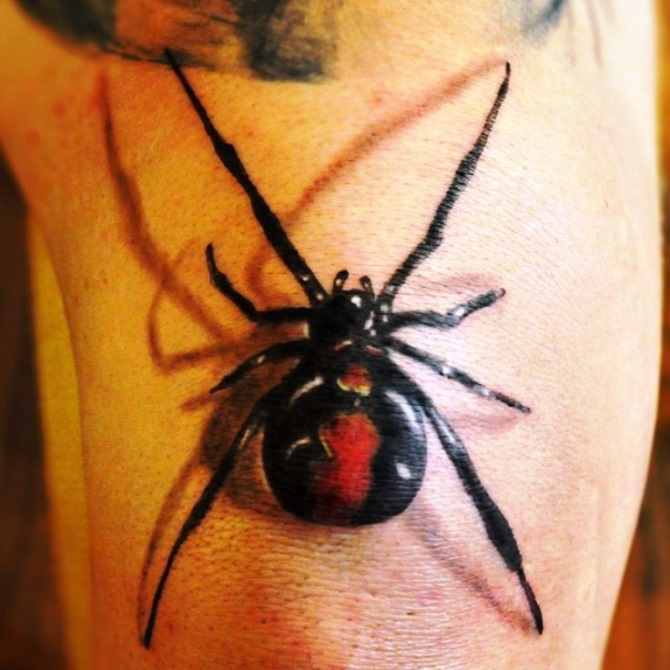 Red And Black Spider Tattoo On Side Leg