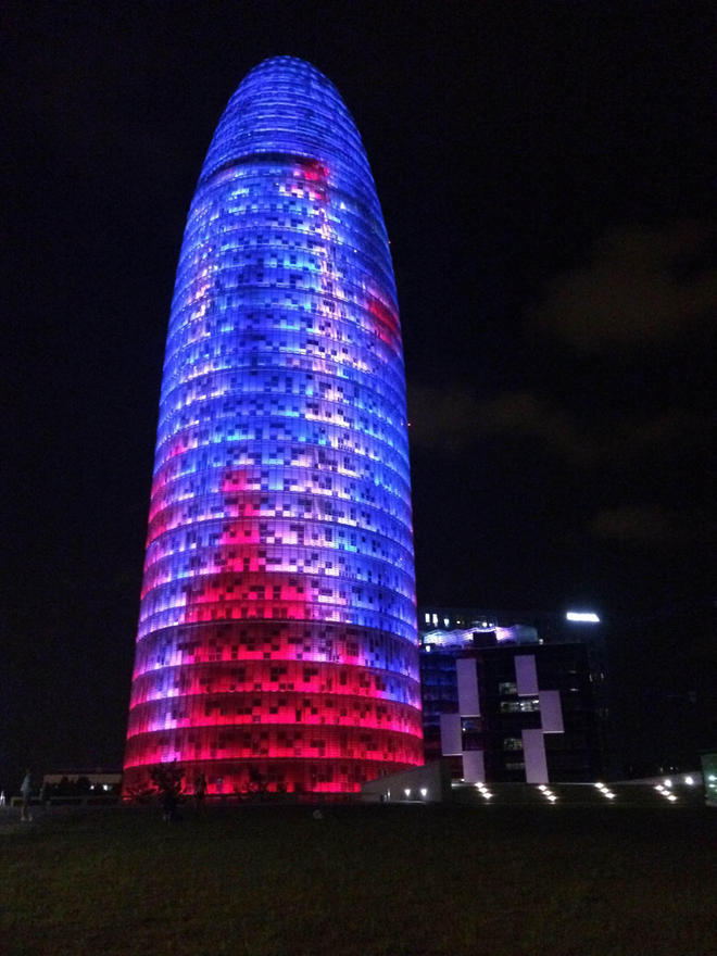 Red And Blue Lights On Torre Agbar During Night