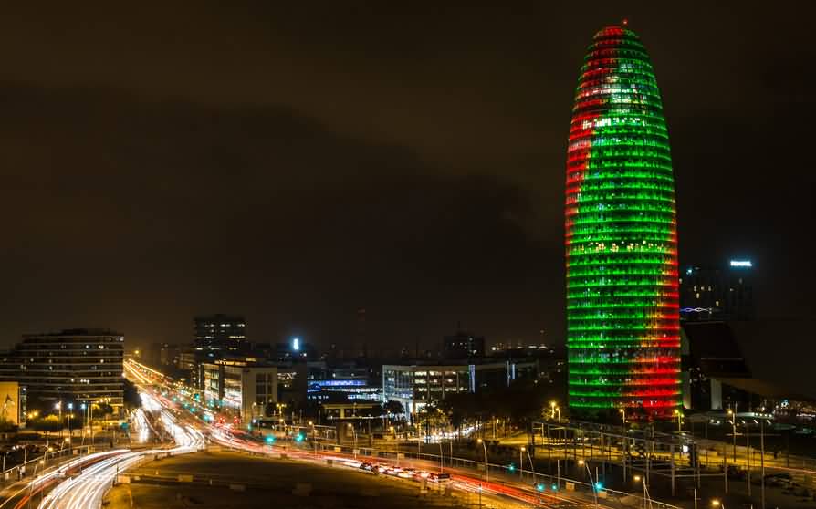 Red And Green Lights On Torre Agbar At Night