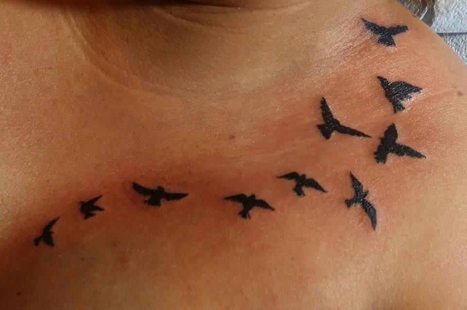 Silhouette Flying Birds Tattoo On Left Front Shoulder