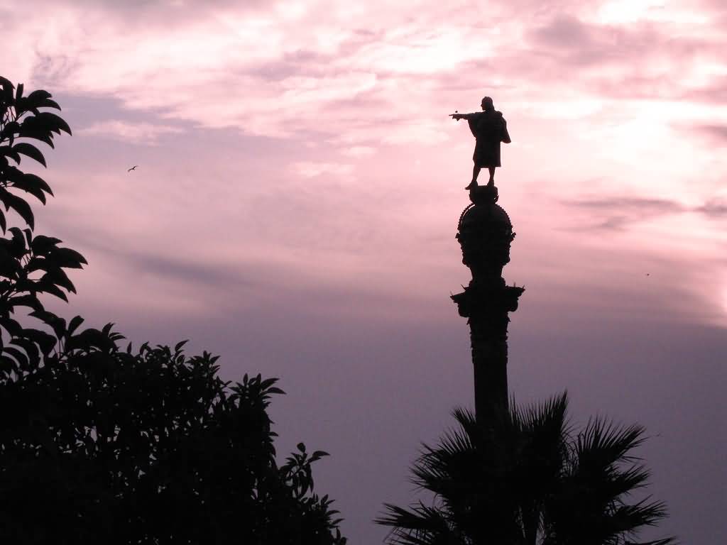 Silhouette View Of The Columbus Monument In Barcelona During Sunset