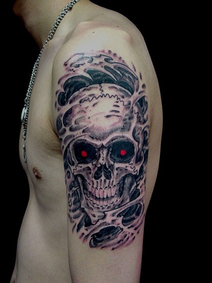 Skull Tattoo On Man Left Shoulder