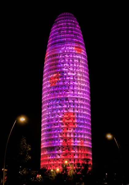 Torre Agbar Looks Beautiful With Red And Pink Lights