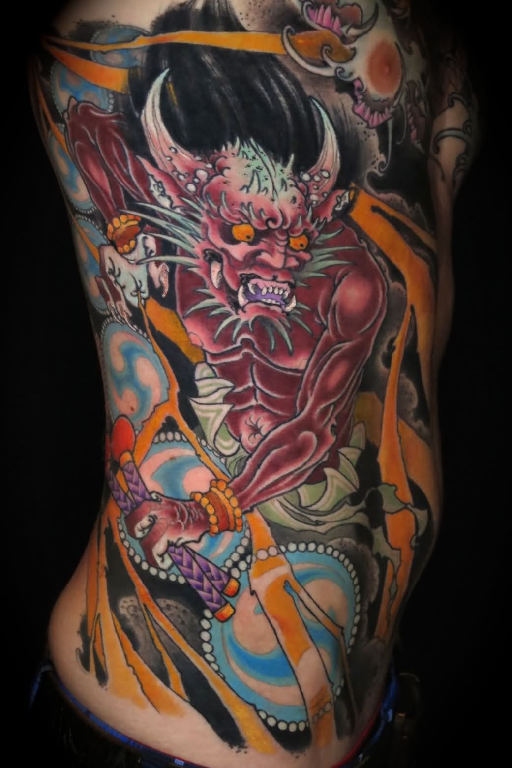 Traditional Demon Tattoo On Man Right Side Rib