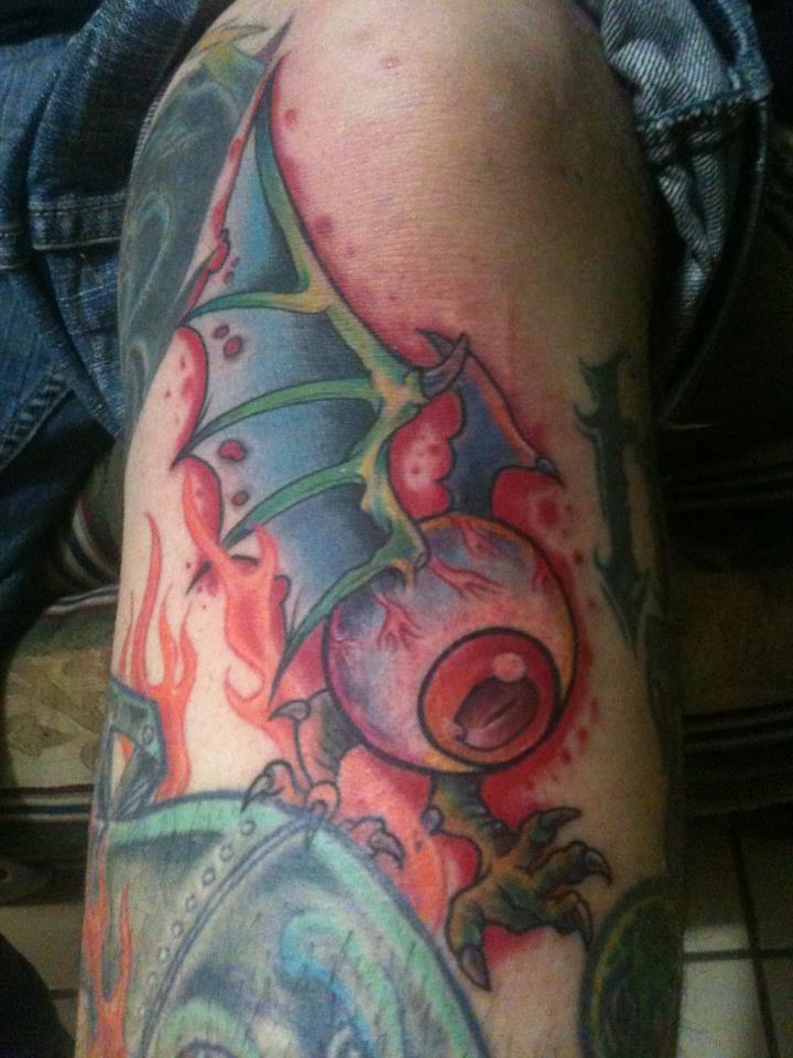 Traditional Flying Eye With Bat Wings Tattoo On Left Leg By Pig legion