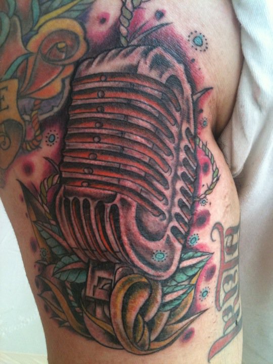 Traditional Mic Tattoo On Right Half Sleeve By Pig legion