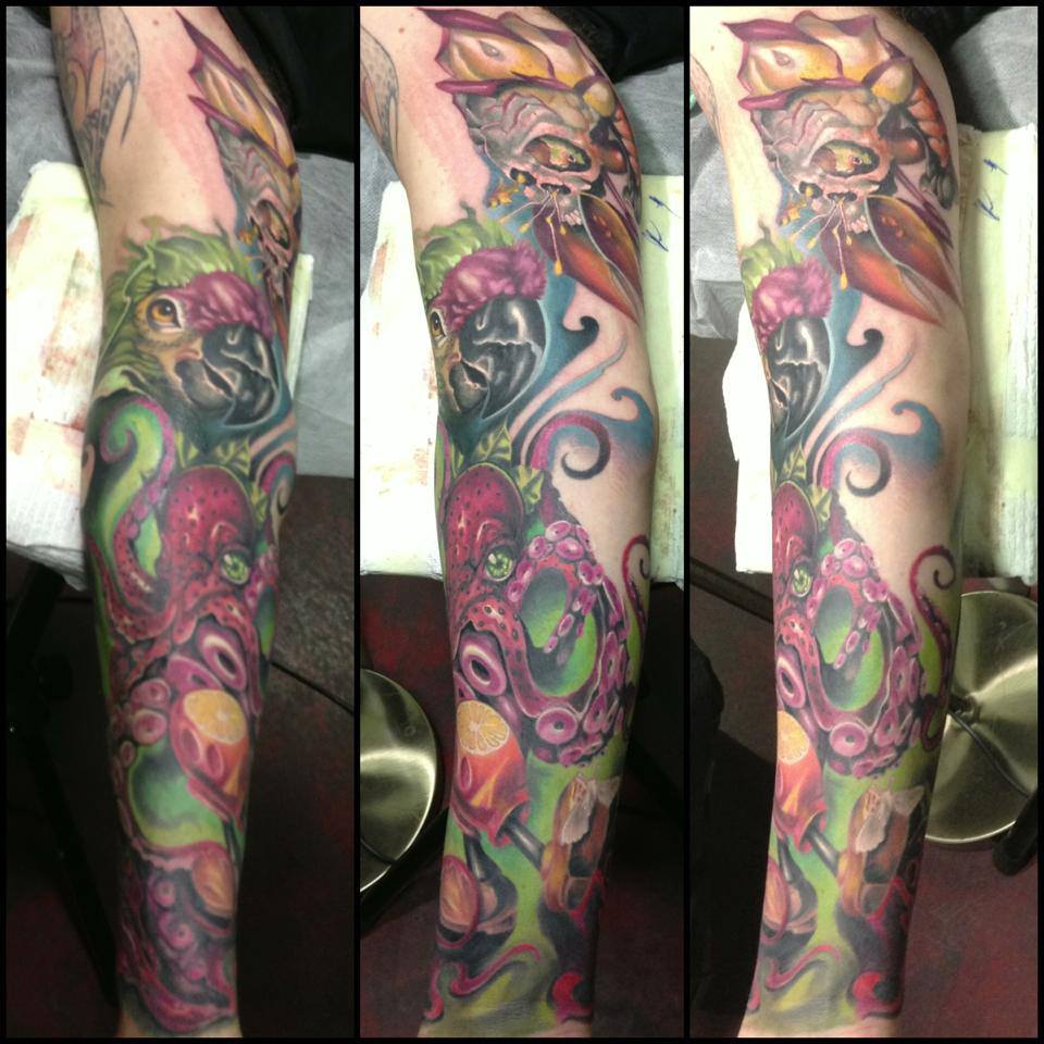Traditional Parrot With Octopus Tattoo On Right Full Sleeve