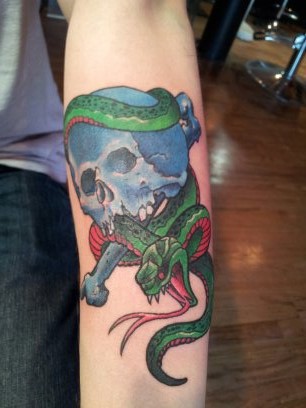 Traditional Snake With Skull Tattoo On Forearm