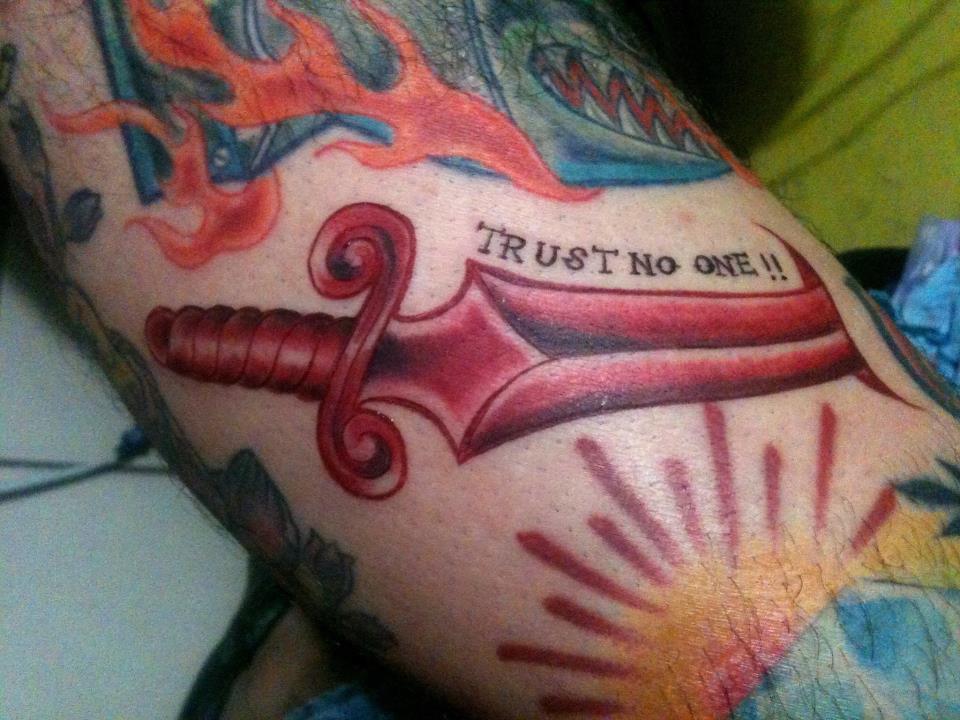 Trust No One – Red Ink Sword Tattoo On Right Half Sleeve