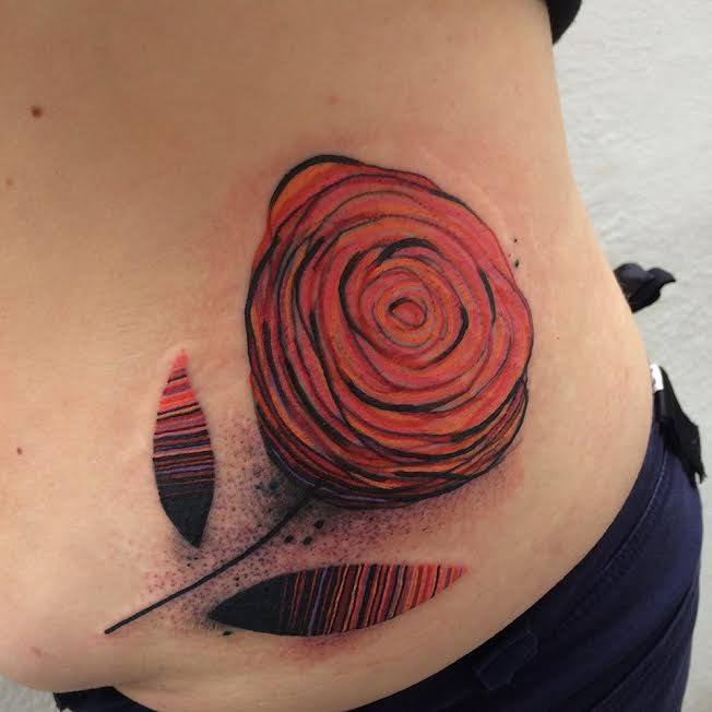 Unique Flower Tattoo On Left Side Rib By Giena Todryk
