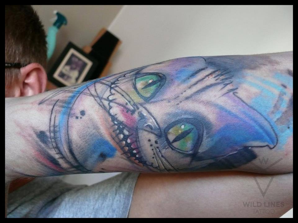 Watercolor Cat Face Tattoo On Man Left Forearm