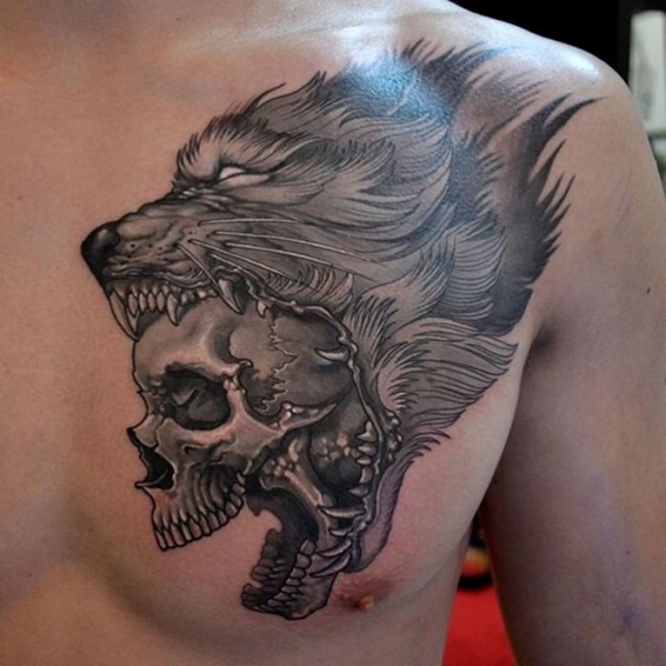 Wolf Head And Skull Tattoo On Man Chest
