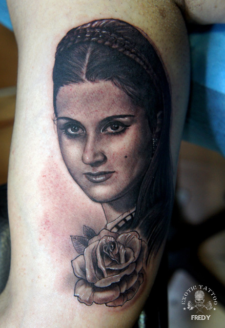 Women Face With Rose Tattoo On Right Bicep By Fredy
