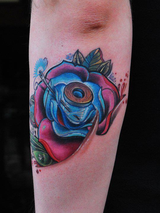 Wonderful Rose Tattoo On Arm By Fredy